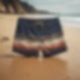 Stylish board shorts on a sandy beach