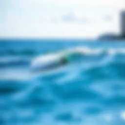 A stunning view of Waikiki Beach showcasing perfect waves for surfing.