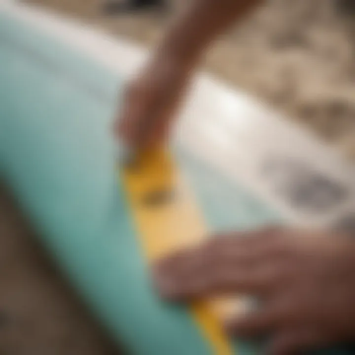 An expert analyzing surfboard dimensions with a measuring tape