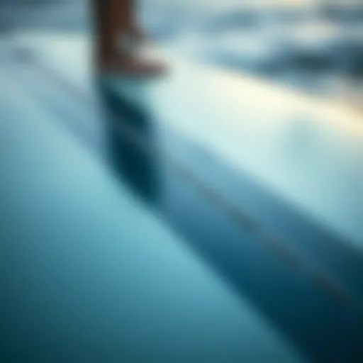 Detailed Examination of Surfboard Contours Close-up view of a six-foot surfboard showcasing its contour and design elements