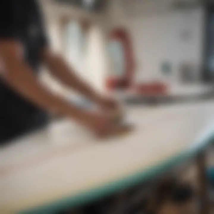 Surfboard undergoing maintenance with epoxy repair kit