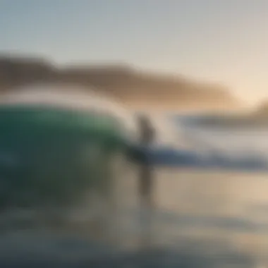 Lone Surfer in Calm Waves A lone surfer navigating through tranquil waves during dawn