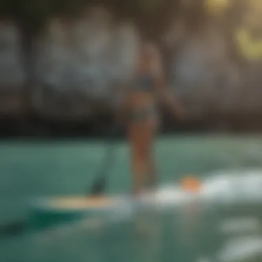 Paddleboarder Strengthening Balance through Yoga Paddleboarder performing balance exercise