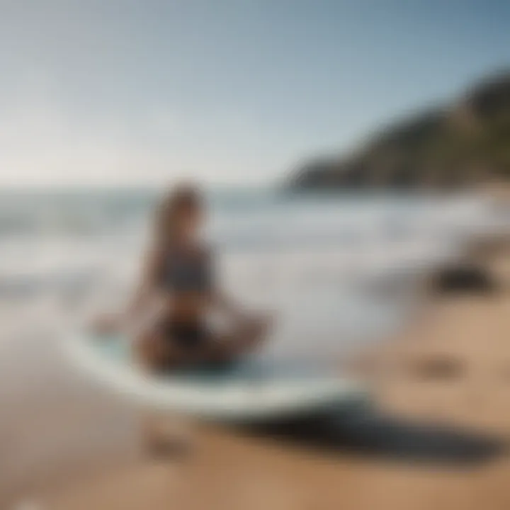 Yoga mat beside surfboard on the ocean shore