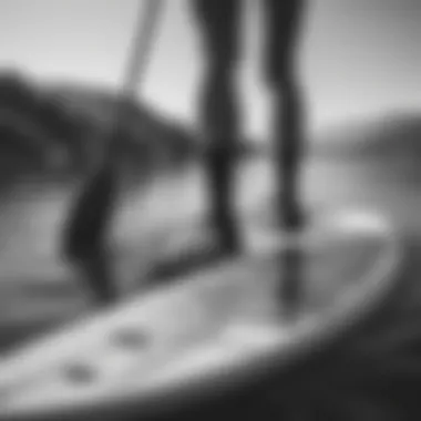 Close-up of black and white stance socks worn during paddleboarding