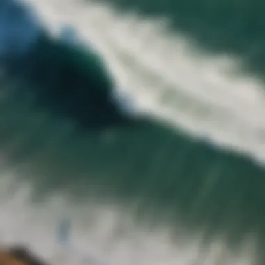 Stunning aerial view of Chicama surf break showcasing long, perfect waves.