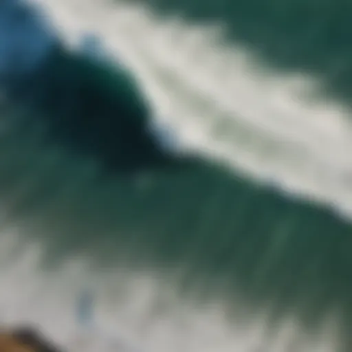 Stunning aerial view of Chicama surf break showcasing long, perfect waves.