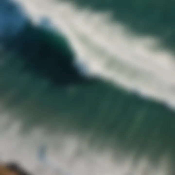 Stunning aerial view of Chicama surf break showcasing long, perfect waves.