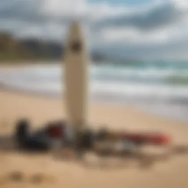 Equipment and surfboard setup on the beach, illustrating essential gear for a surfing adventure.