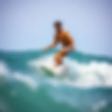 Surfer riding a wave in stylish boardshorts