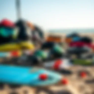Essential Kitesurfing Gear Display Detailed view of essential kitesurfing gear laid out on the beach