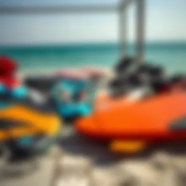 Various kitesurfing equipment laid out for sizing comparison