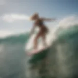 Dynamic action shot of a surfer wearing a Quiksilver bikini, showcasing performance in the waves.