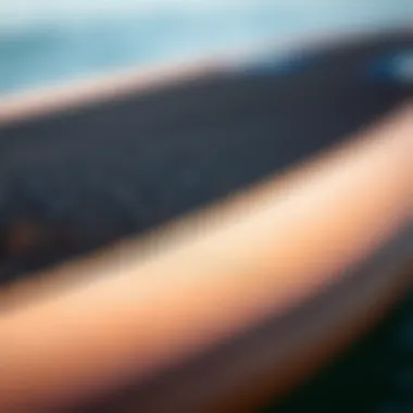 Close-up of a skimboard highlighting material textures