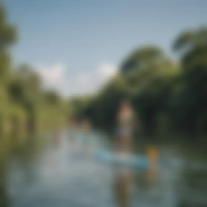 A group of friends having fun while paddleboarding together.