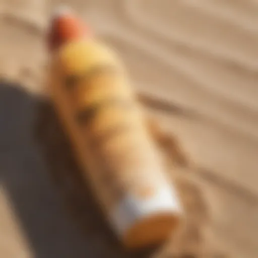 Close-up of Sun Bum tinted sunscreen on a sandy beach