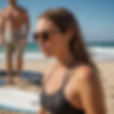 Watersports enthusiast applying sunscreen before surfing