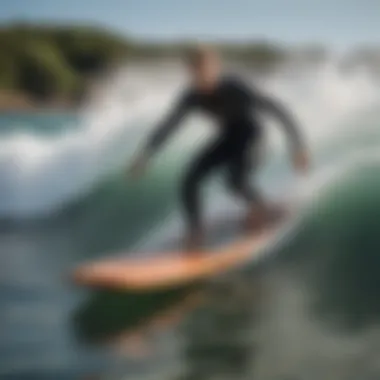 The Alaia Board in Action on Water Alaia board in action on a perfect wave