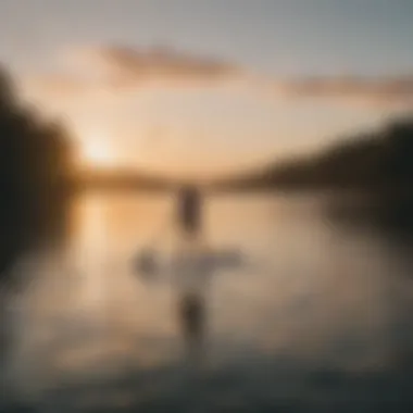Paddleboarding Serenity Serene paddleboarding at sunset