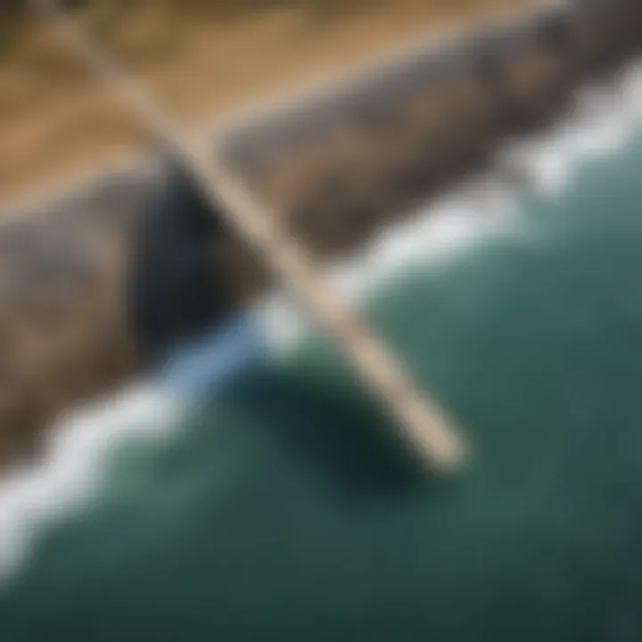 An aerial view of a cantilever seawall in a coastal area.