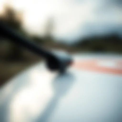 Detail of FCS Surfboard Leash Attachment Close-up of FCS surfboard leash attachment