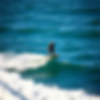 A rider being towed by a surf winch, gliding over the water