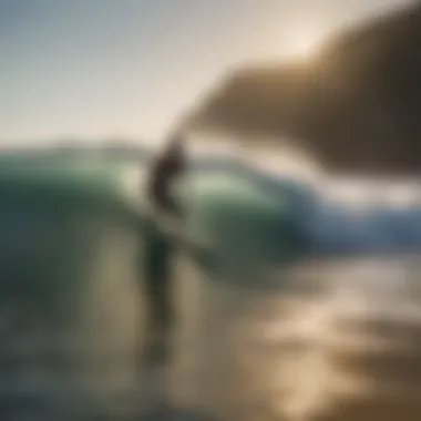 A surfer catching a wave at dawn