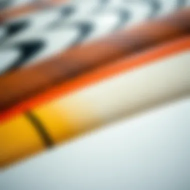 A close-up view of different foil surfboard materials, highlighting their unique textures and colors.