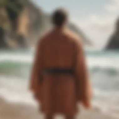 An outdoor scene featuring a surfer using a changing robe for privacy.