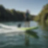 A sleek motorized SUP board gliding over calm waters