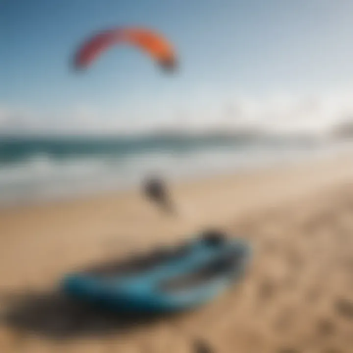 A serene beach setting with kites and equipment laid out for a kitesurfing session.