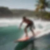 A surfer expertly maneuvers a surfboard while being towed by a boat