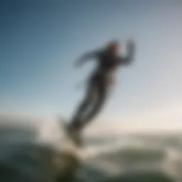 A kitesurfer gracefully gliding over the water, showcasing agility and skill.