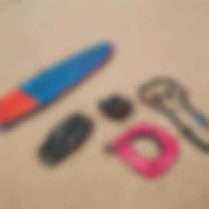 Colorful kitesurfing gear laid out on the sandy beach