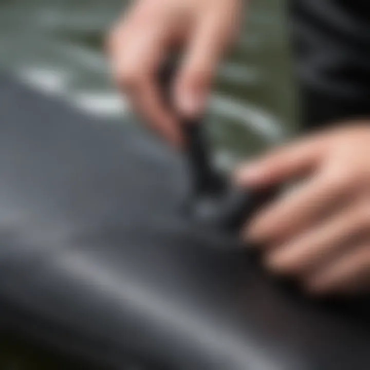 Close-up of neoprene repair glue application on wetsuit