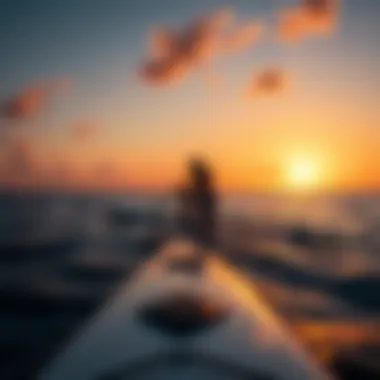 A serene scene of a paddleboarder gliding through calm waters at sunset.