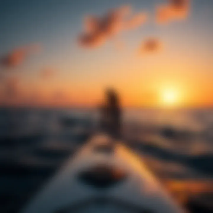 A serene scene of a paddleboarder gliding through calm waters at sunset.