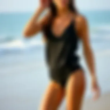 Fit and Design of the Rip Curl Classic Surf Romper Model showcasing the fit and design of the Rip Curl Classic Surf Romper on the beach