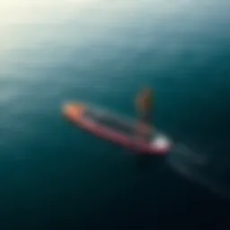 A self-propelled stand-up paddle board gliding smoothly on a serene water surface