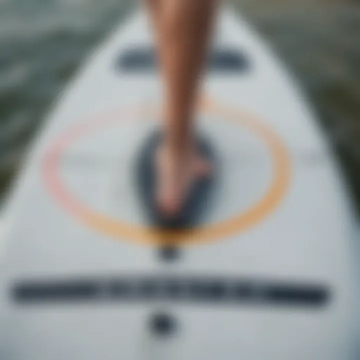 Close-up of paddle board dimensions marked on a measuring tape