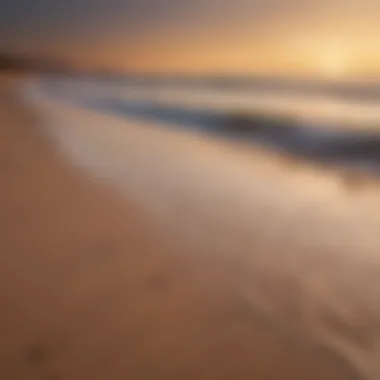 Quiet beach at sunset with soft sand