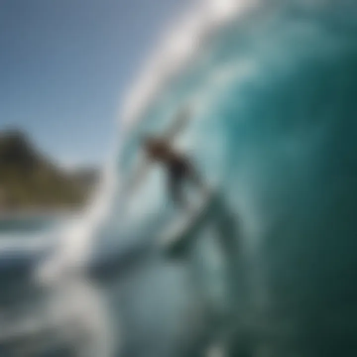 A surfer carving through a crystal-clear wave