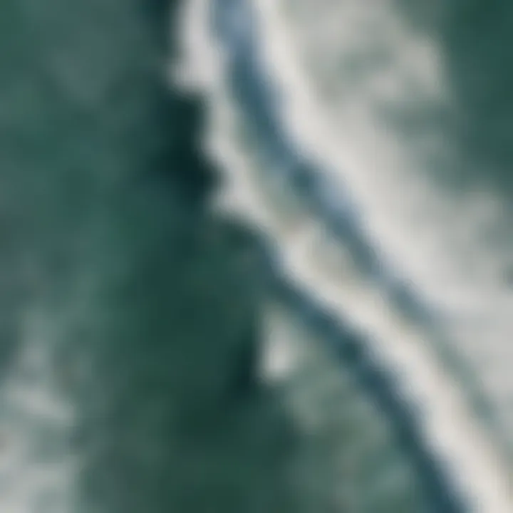 A breathtaking aerial view of surfers catching waves