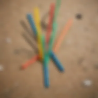 A close-up of a plastic straw discarded on a beach