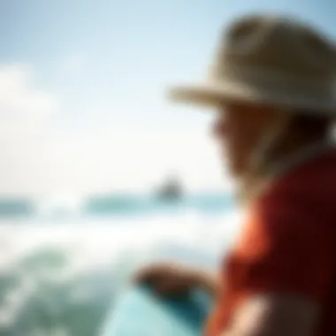 Watersport Enthusiast with Melin Rope Hat A scenic view of a watersport enthusiast wearing the Melin Rope Hat while engaging in surfing.