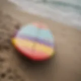 A vibrant skipper surfboard on the shore