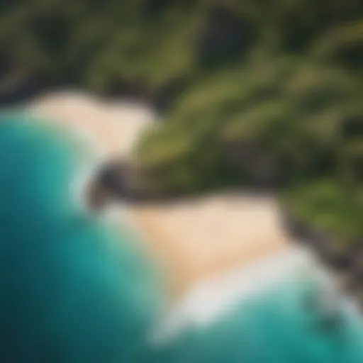 Aerial view of a pristine beach with turquoise waters and lush greenery