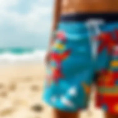 Vibrant board shorts displayed on a sandy beach