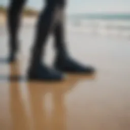 Wetsuit booties on a sandy beach
