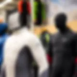 Diverse types of wetsuits displayed for comparison